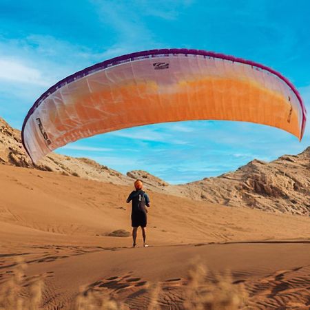 Отель Al Badayer Retreat By Sharjah Collection Margham Экстерьер фото Parachute landing on the dunes