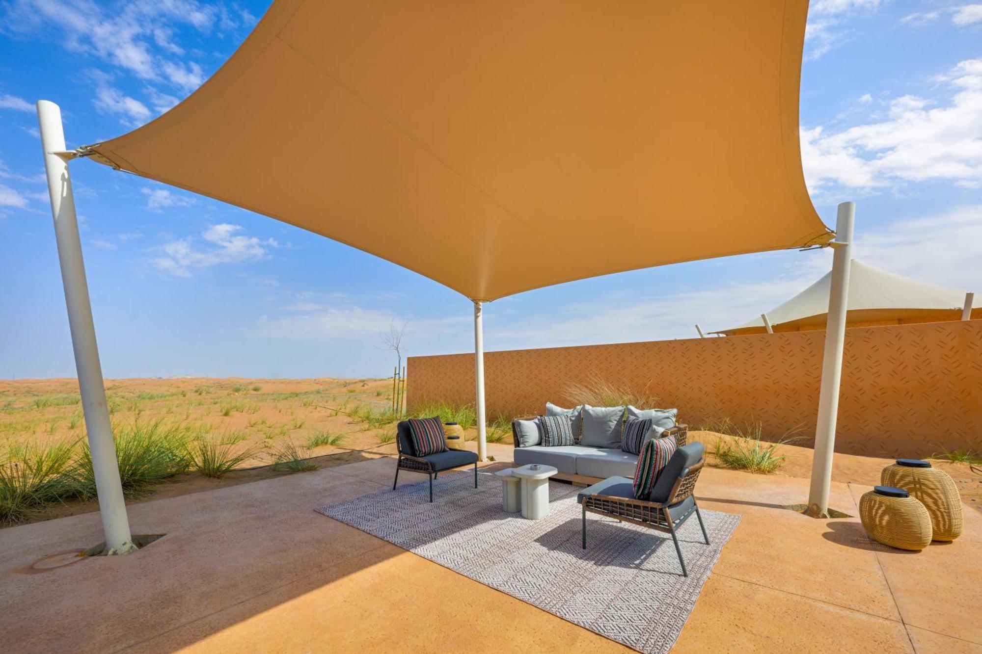 Отель Al Badayer Retreat By Sharjah Collection Margham Экстерьер фото A shade sail at the Al Maha Desert Resort, Dubai