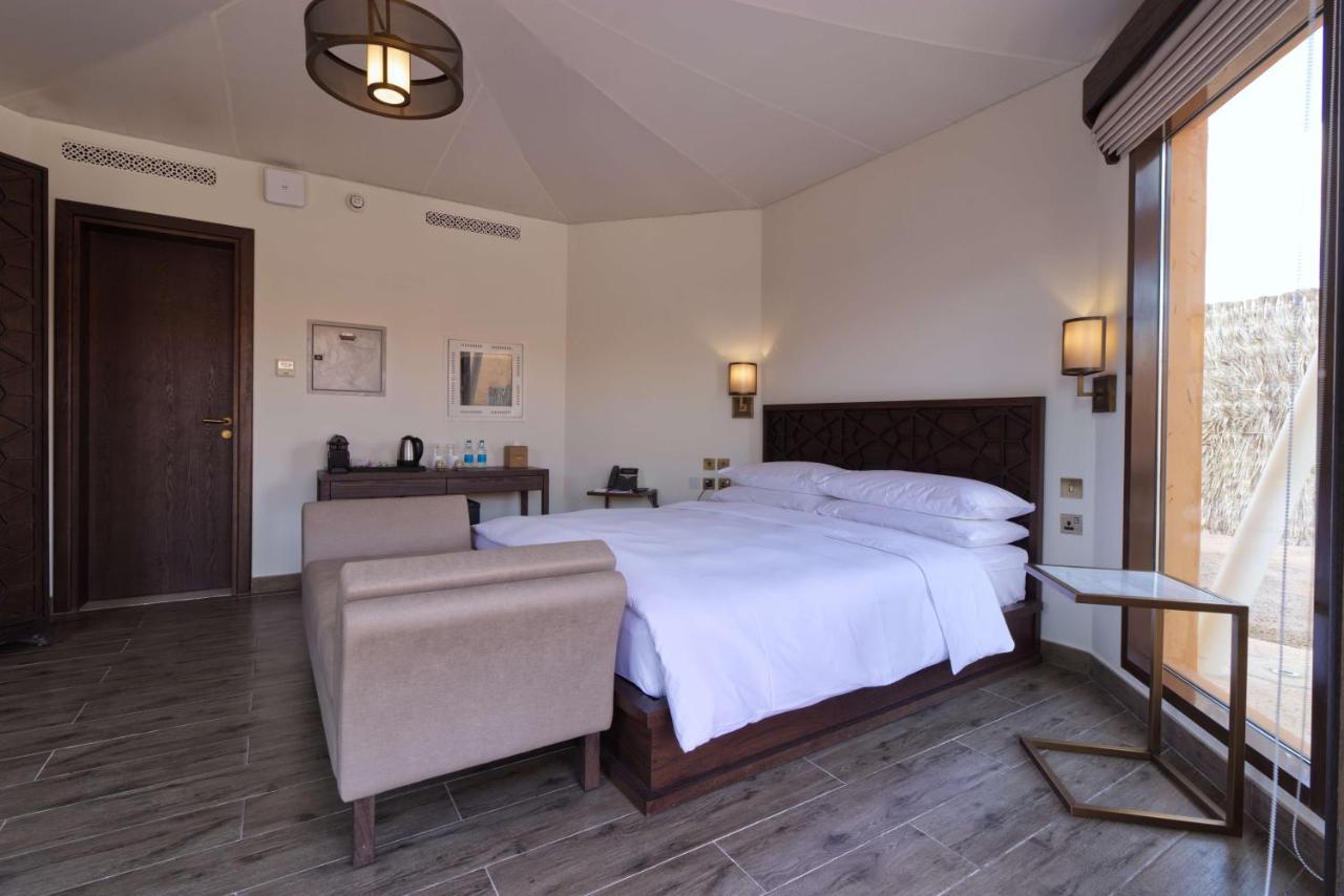 Отель Al Badayer Retreat By Sharjah Collection Margham Экстерьер фото A bedroom at the Al Maha Desert Resort